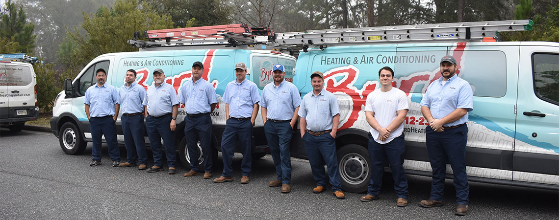 Byrd Heating And Airconditioning Team In Front Of Van