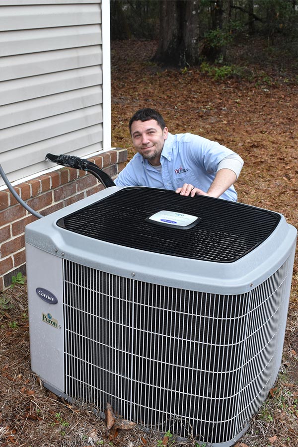 Byrd Heating And Airconditioning Team Tech Doing Ac Repair