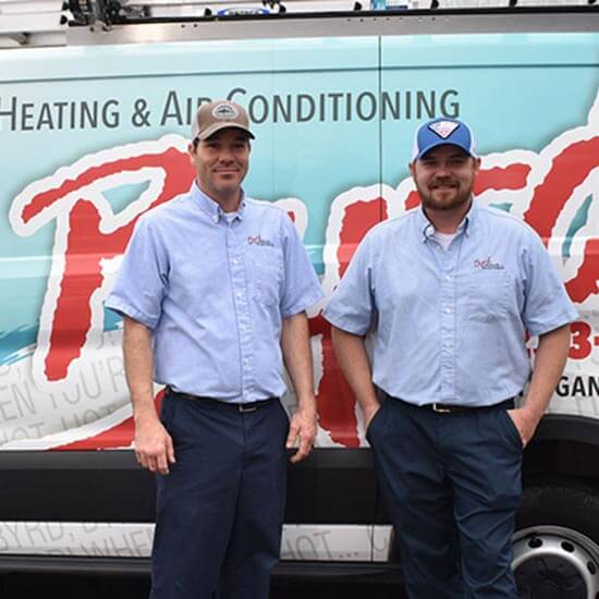 Byrd Heating And Airconditioning Team Tech In Front Of Van