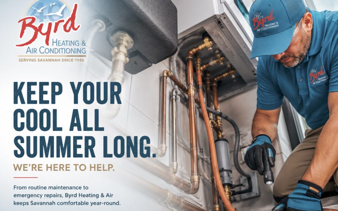 Byrd Heating & Air technician inspecting an indoor HVAC system during a summer air conditioning tune-up in Savannah, Georgia.